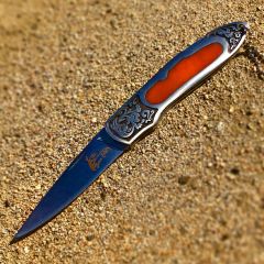 8" The Bone Edge Stainless Steel Folding Knife with Engraved Orange Colored Handle